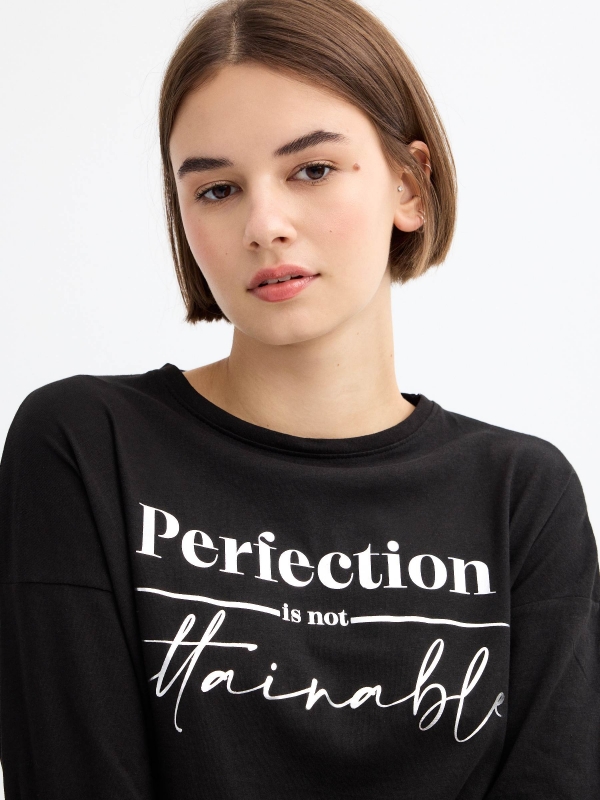 Black long sleeve t-shirt with graphic black detail view