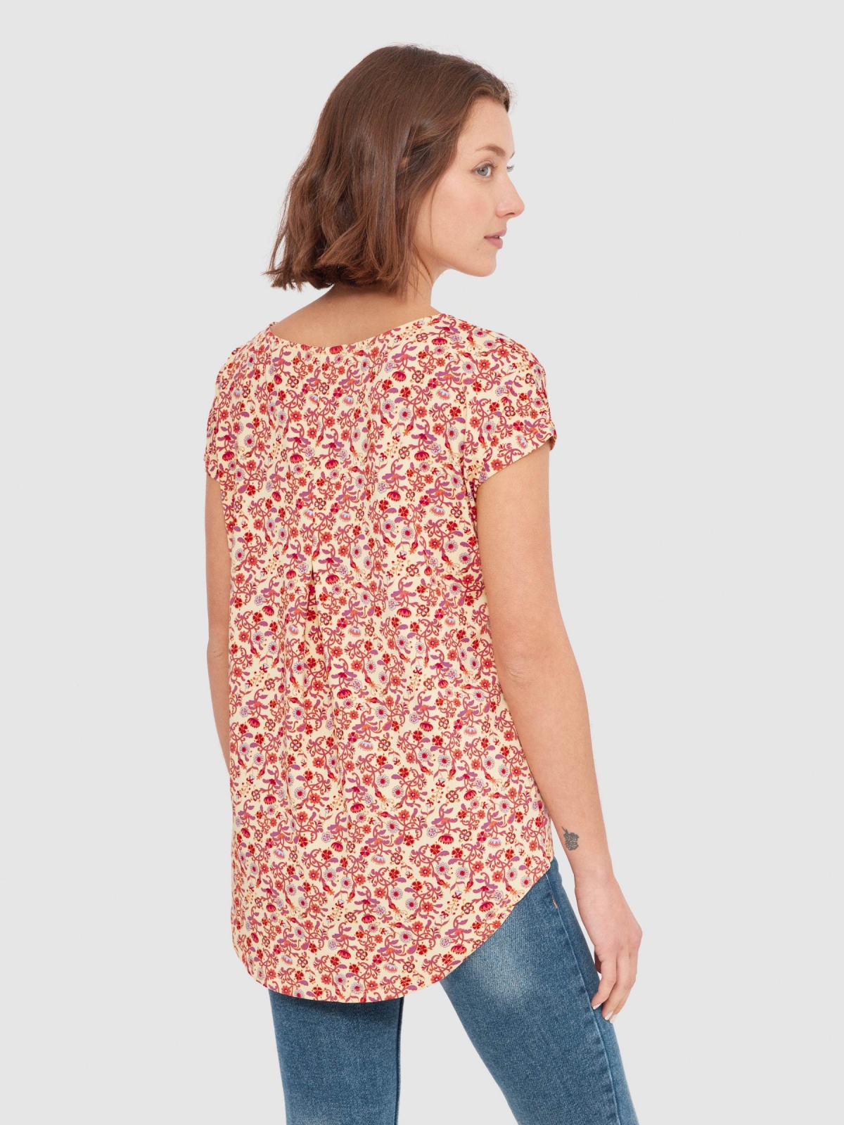 Floral sleeveless T-shirt. sand middle back view