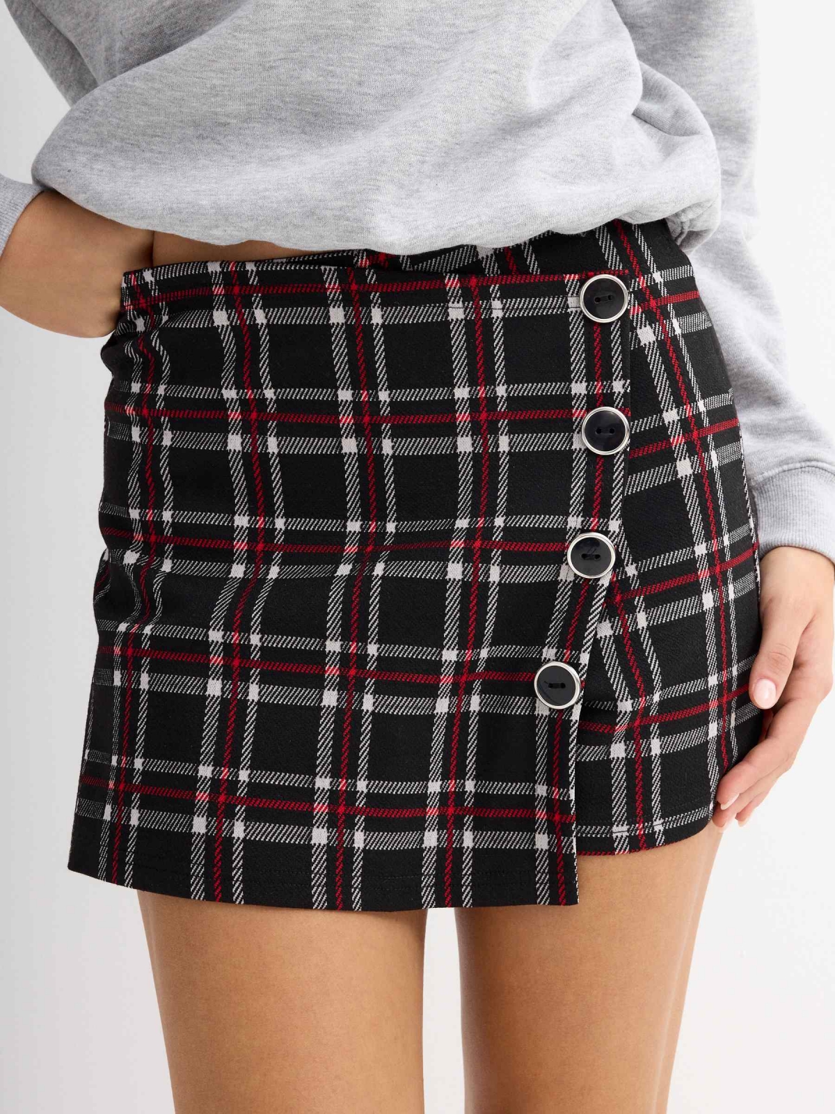 Red plaid skort with buttons black front detail view