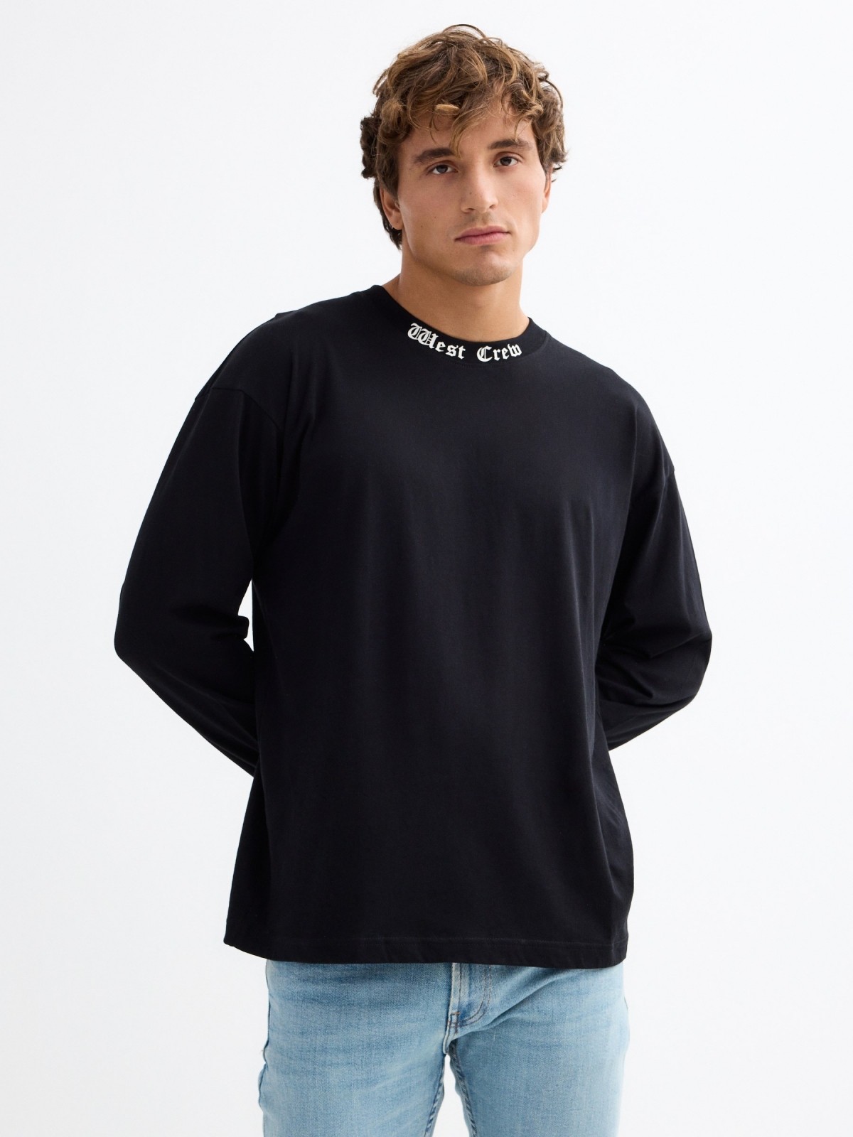 Long sleeve black t-shirt with graphic black middle front view