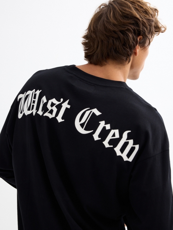 Long sleeve black t-shirt with graphic black detail view