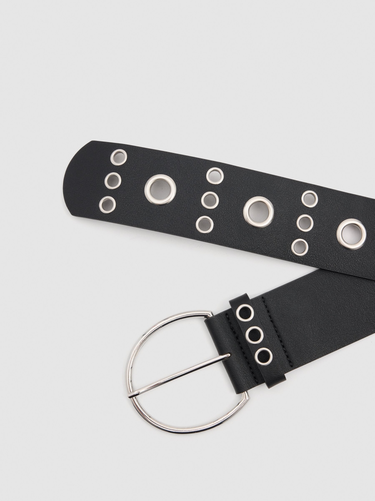 Black leatherette belt with round buckle eyelets. black detail view