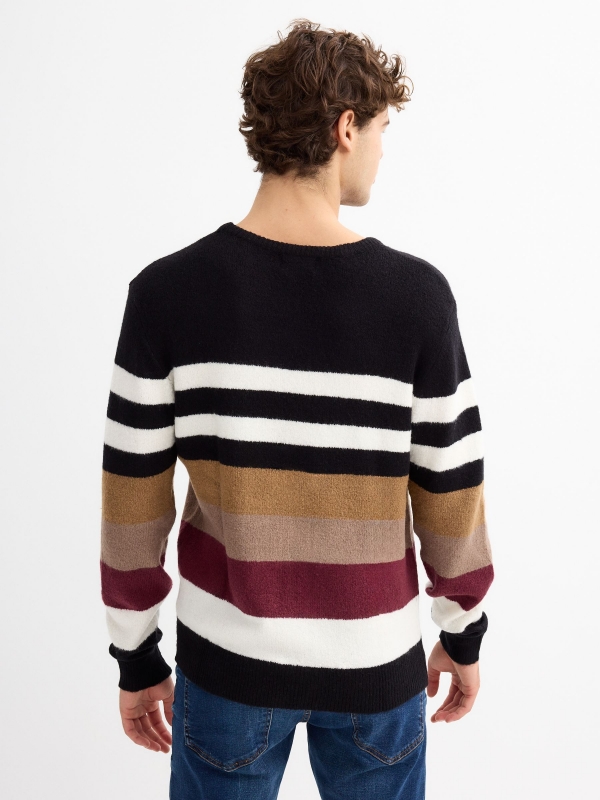 Contrasting striped jumper black middle back view