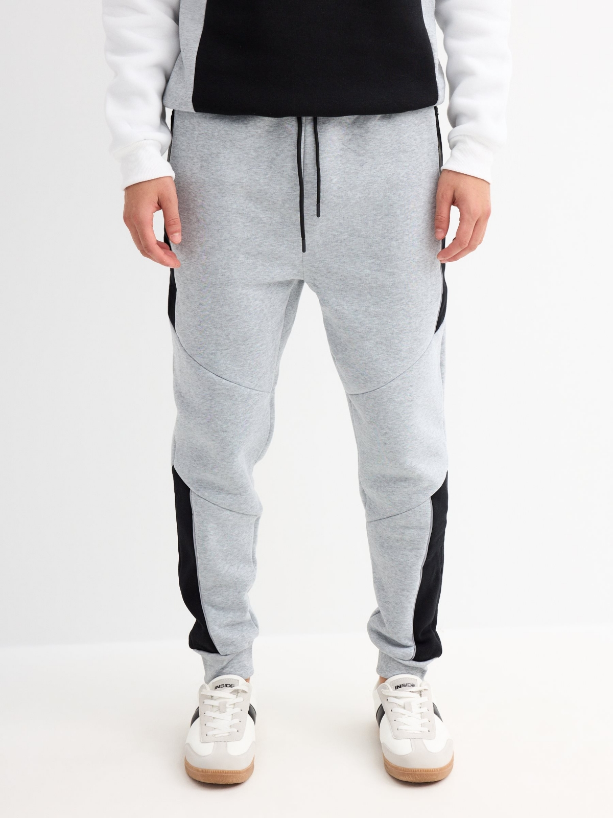 Block color jogger pants light grey middle front view