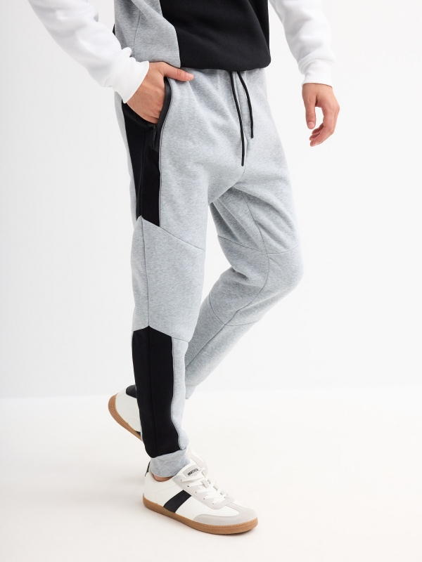 Block color jogger pants light grey detail view