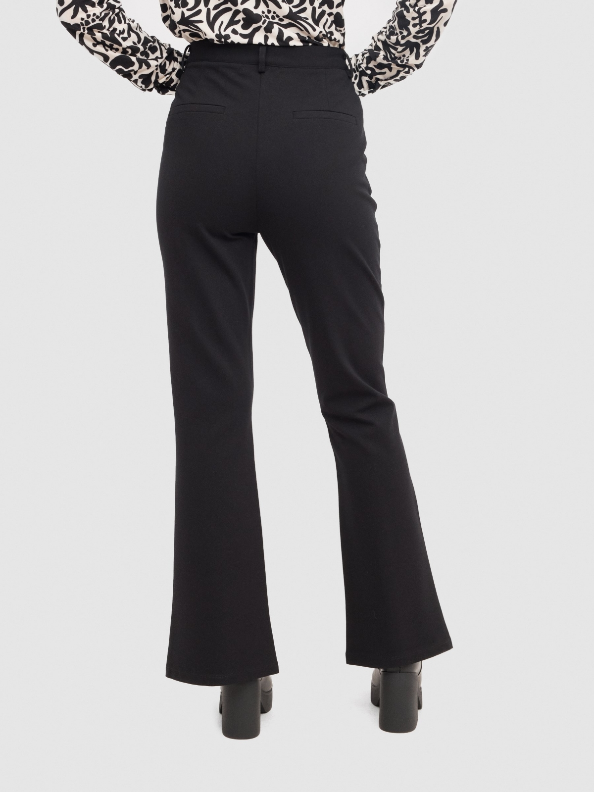 Flared dress pants with opening black detail view