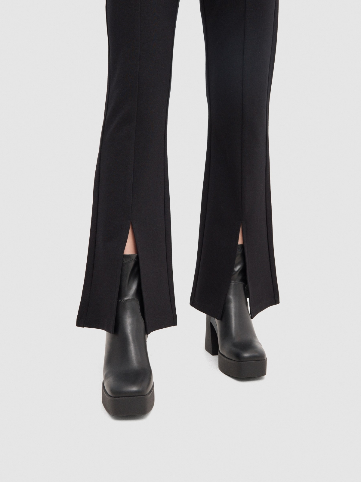 Flared dress pants with opening black detail view