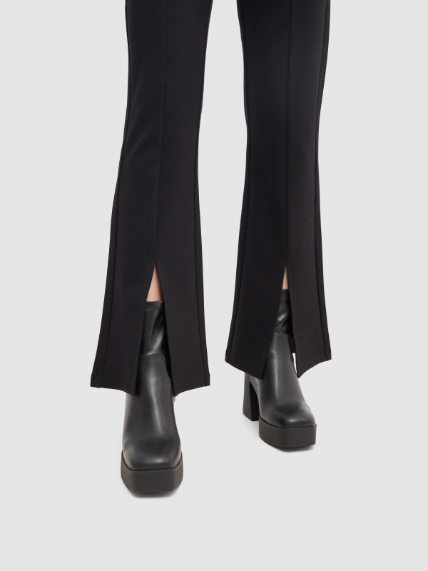 Flared dress pants with opening black detail view