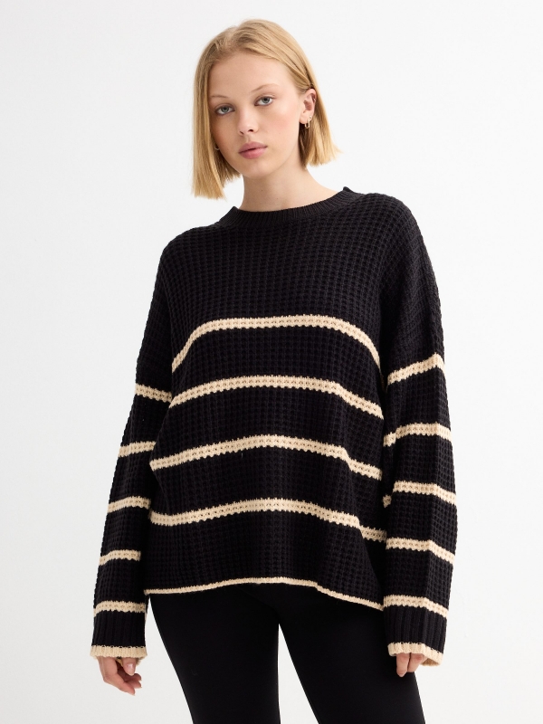 Oversize knitted sweater black stripes black middle front view